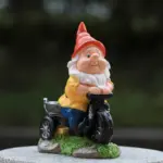Gnome Riding Bicycle Garden Statue
