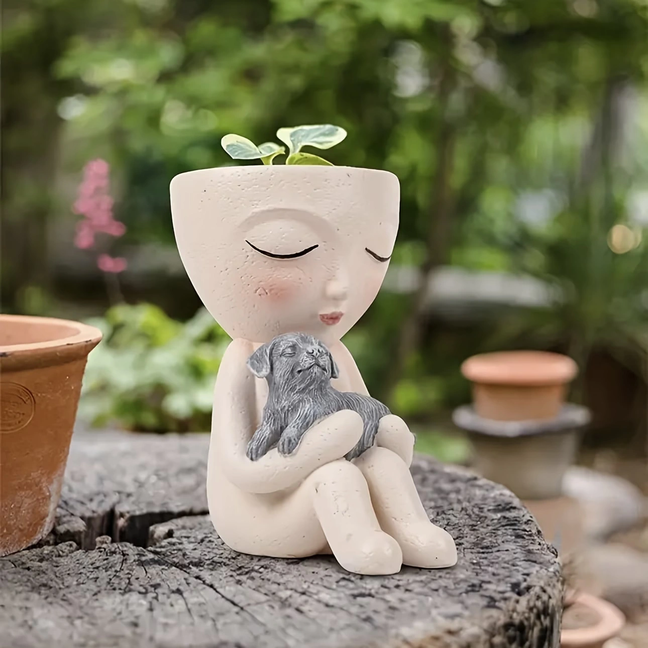 db4c1e30-8db5-4989-b3f9-1a4233f3cc93 Girl and Dog Resin Planter - Image 1