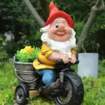 Gnome Riding Bicycle Garden Statue